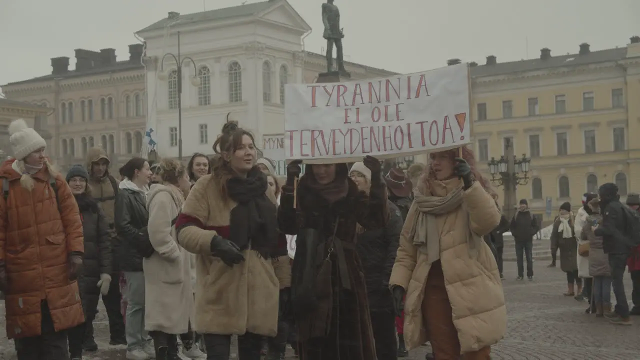 Group of many women protesting in Helsinki downtown