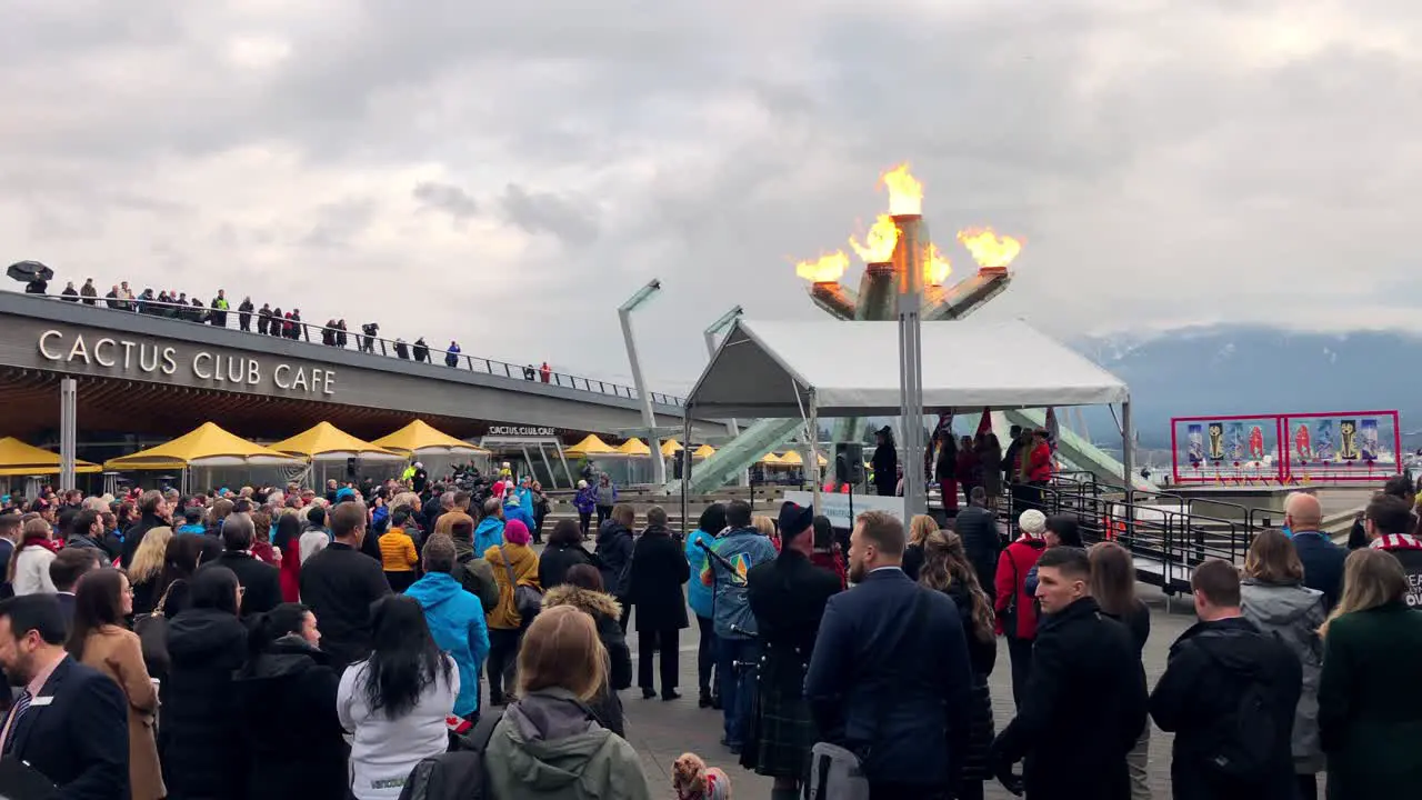 Crowd of people gathering in Vancouver BC Canada by the waterfront for Olympic anniversary celebrations in march 2020