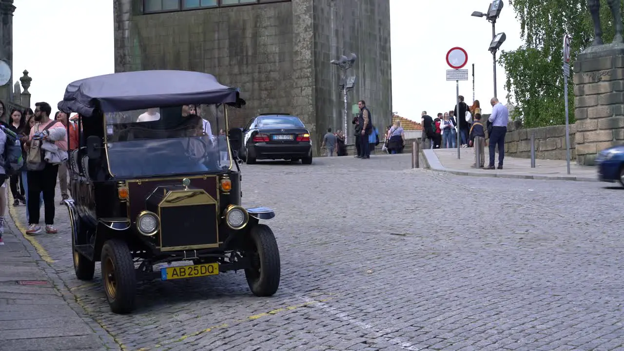 Car waiting for tourists at Terreiro da Se Porto