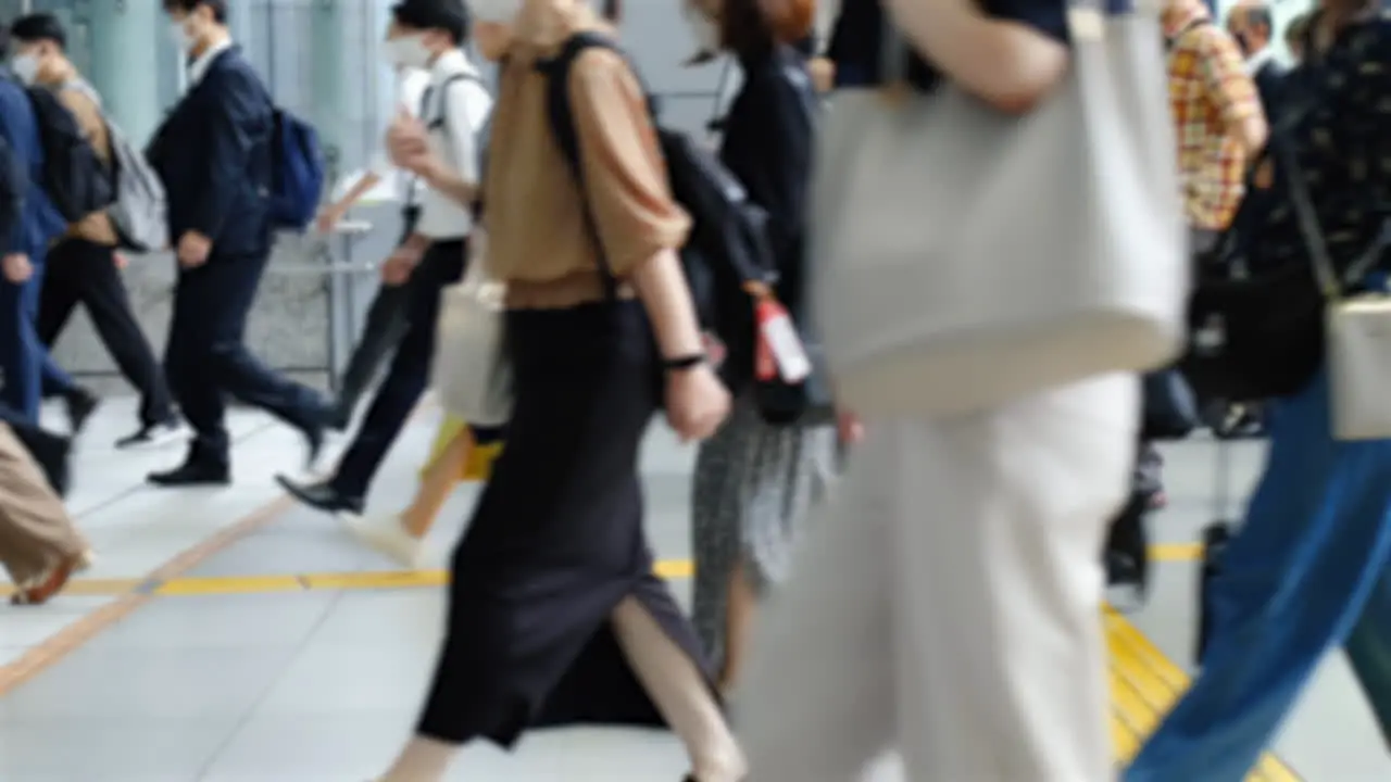 Slow motion crowd of people walking on street