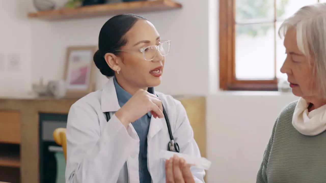 Office doctor and old woman with medication