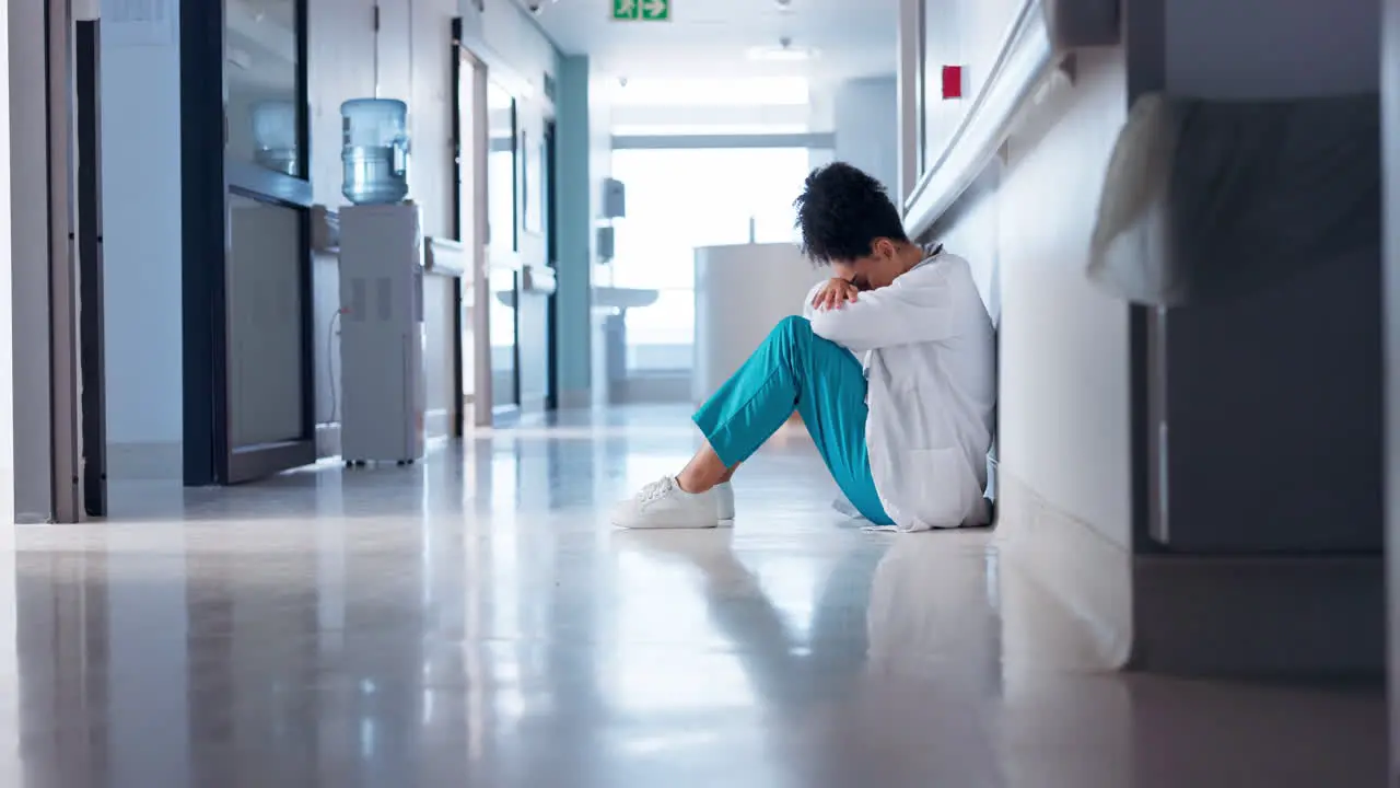 Hospital woman and doctor on the ground