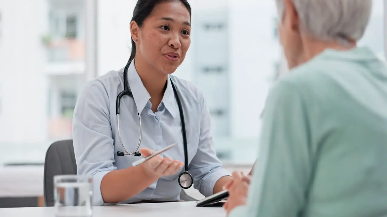 Medical consultation tablet and senior woman