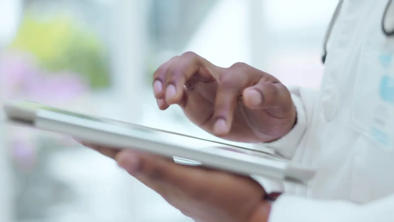 Tablet typing and hands of doctor doing research