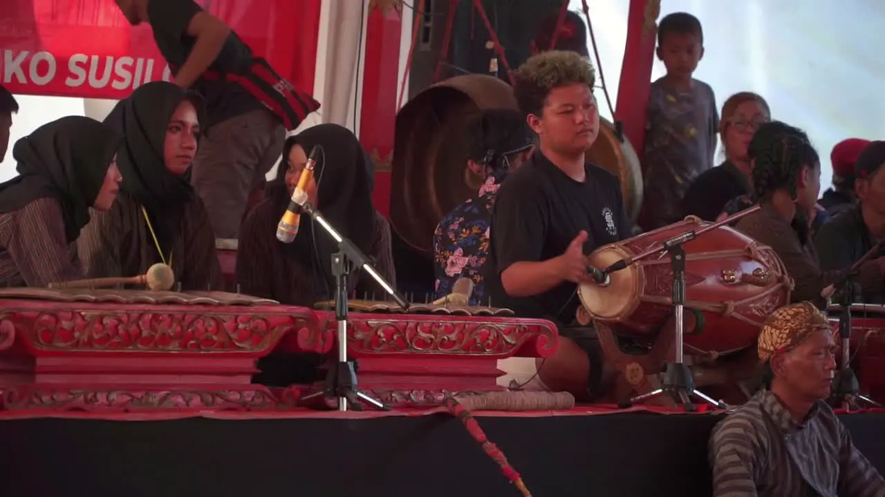 Various musicians playing Indonesian traditional dance topeng ireng music