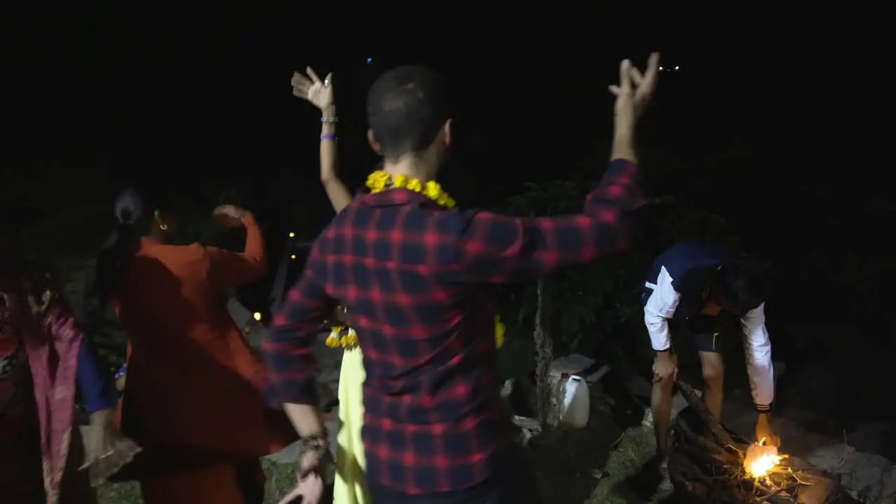 A foreigner dancing with Nepali woman at night