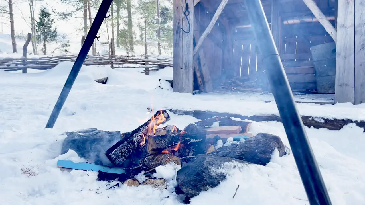 Cozy bonfire during a ski trip in beautiful Norwegian nature