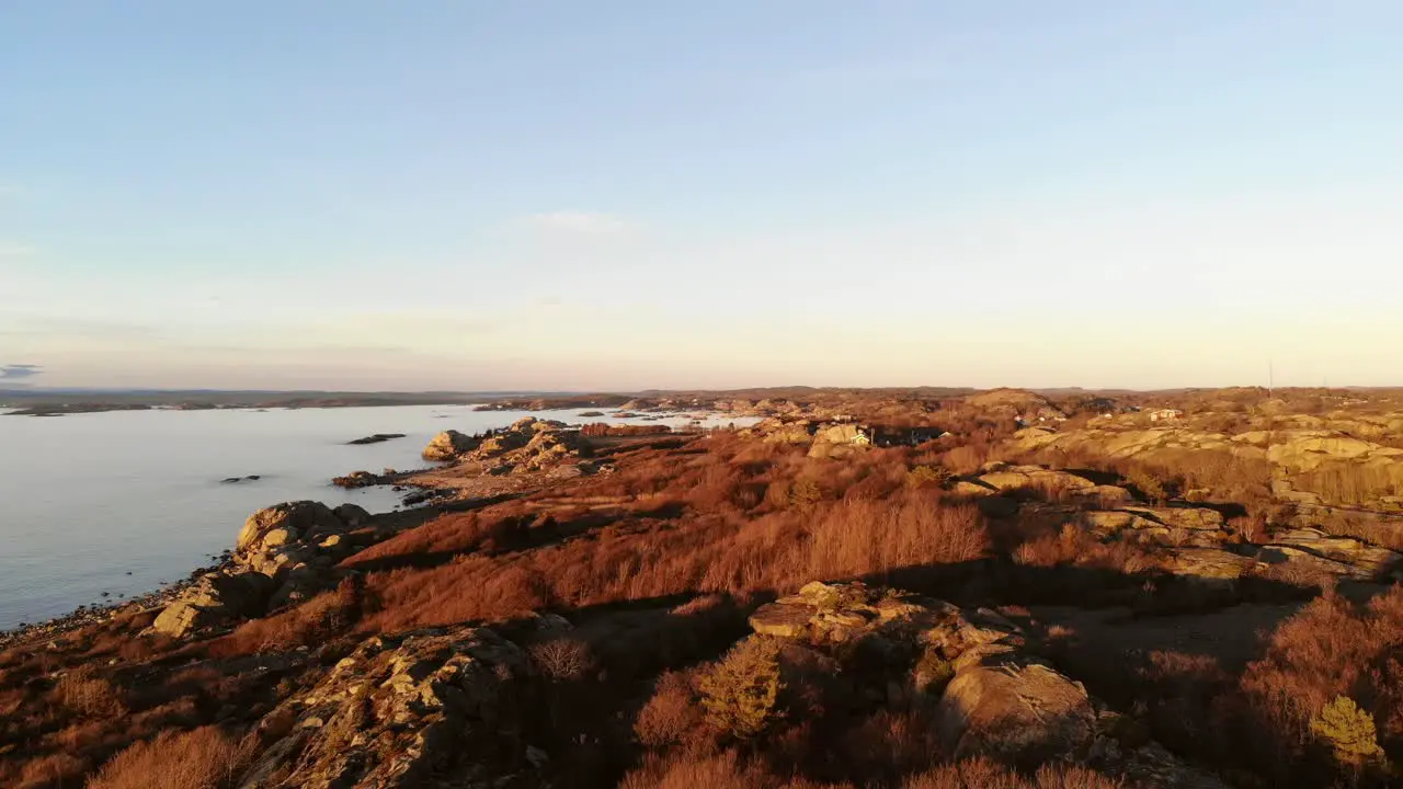 Drone footage of Norway's seacoast at golden hour