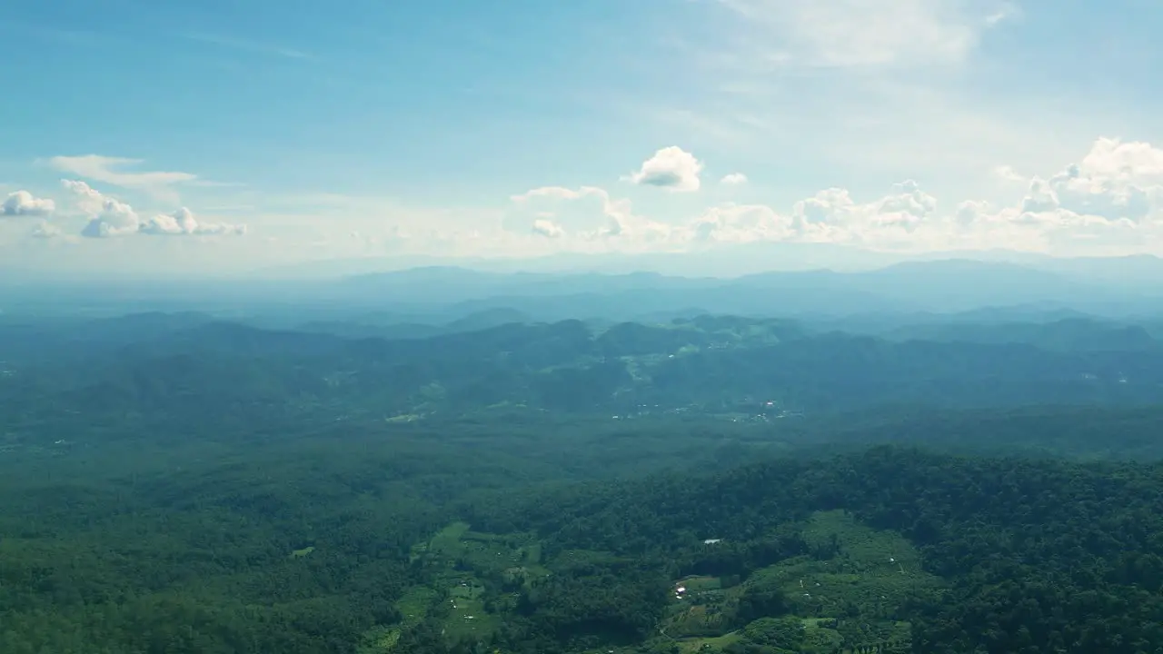 4K Cinematic nature aerial drone footage of the beautiful mountains of Doi Pui next to Chiang Mai Thailand on a sunny day