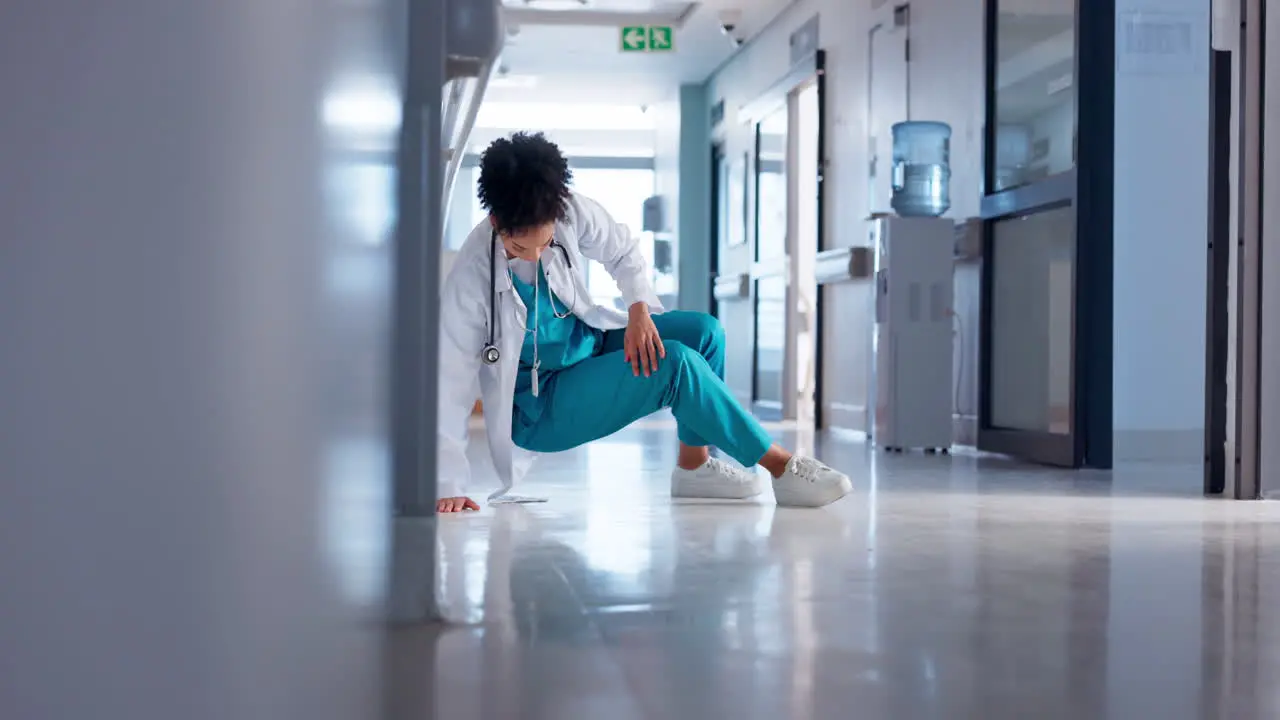 Hospital woman and doctor on the floor