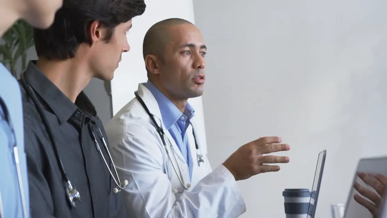 Male doctor talking at a meeting 4k