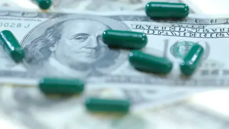 Herbal capsules on dollar cash Medical finance Healthcare business