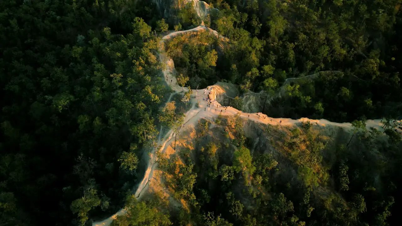 4K Cinematic nature aerial drone footage of the beautiful mountains of Mae Hong Son at the famous canyon next to Pai Thailand during sunset