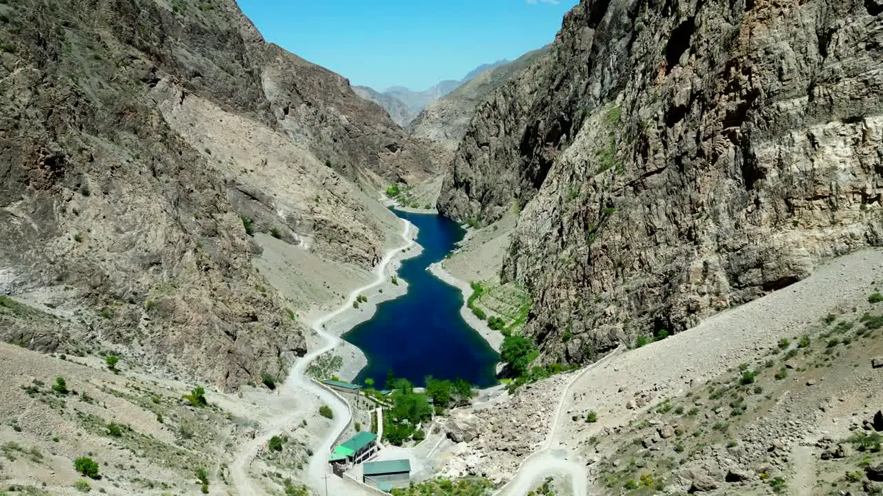 Beautiful drone shot lake in mountain valley in nature of Tajikistan