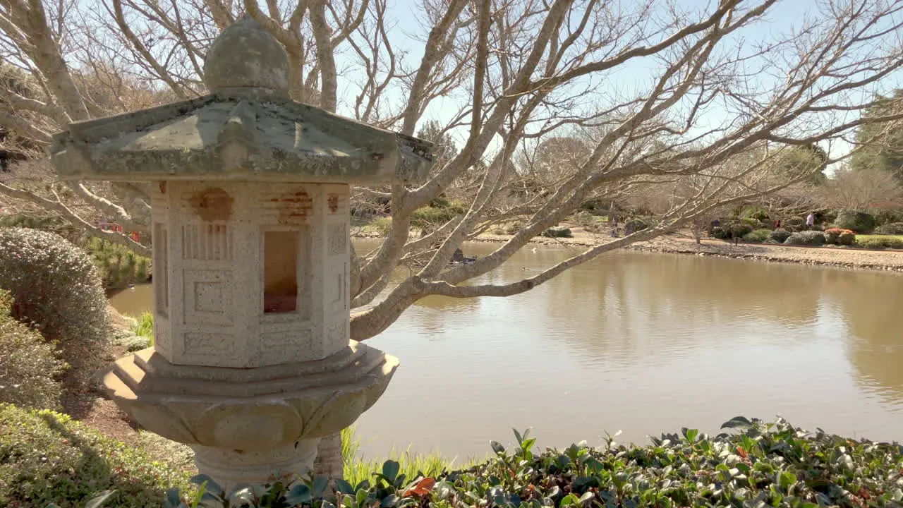 Japanese lantern with pond in background Ju Raku En Japanese Garden Toowoomba Australia