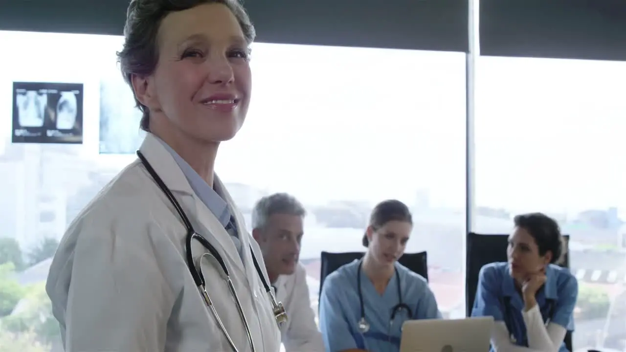 Doctors working and smiling at the camera