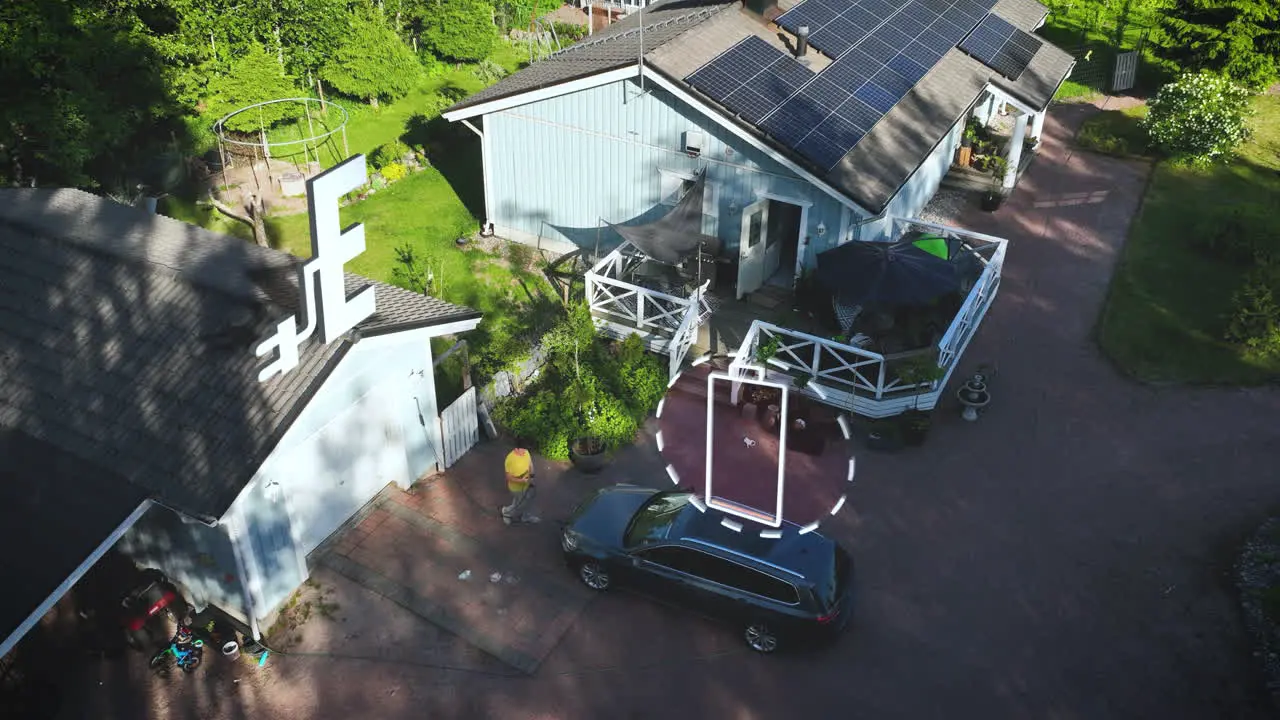 Man plugging in charging a EV car at a solar powered house Motion graphics