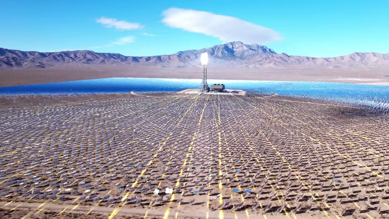 Aerial of solar farm with VFX 3D graphics in the desert sun reflecting off tower renewable technology