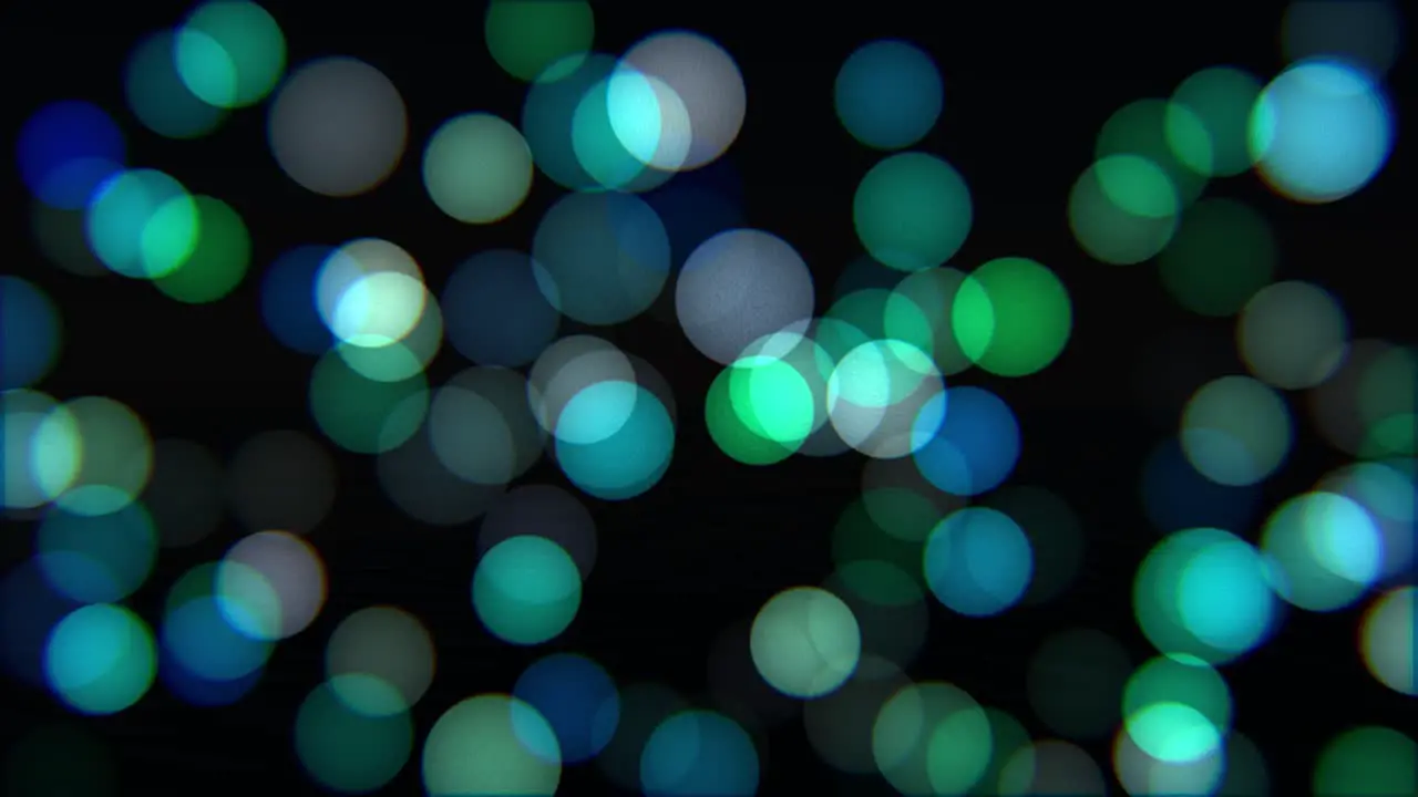 Animation of blue and green bokeh with subtle drift and flicker