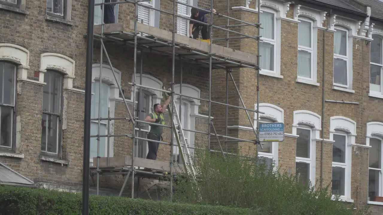 This is a clip of Scaffolders erecting Scaffolding on a house in London England