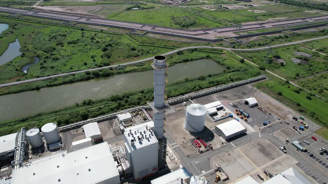 Grain CHP Power station Kent UK chimney storm damaged drone birds eye view