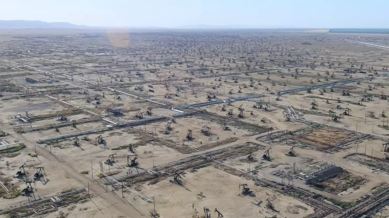 Aerial of Pumpjacks in Fracking Field drilling oil