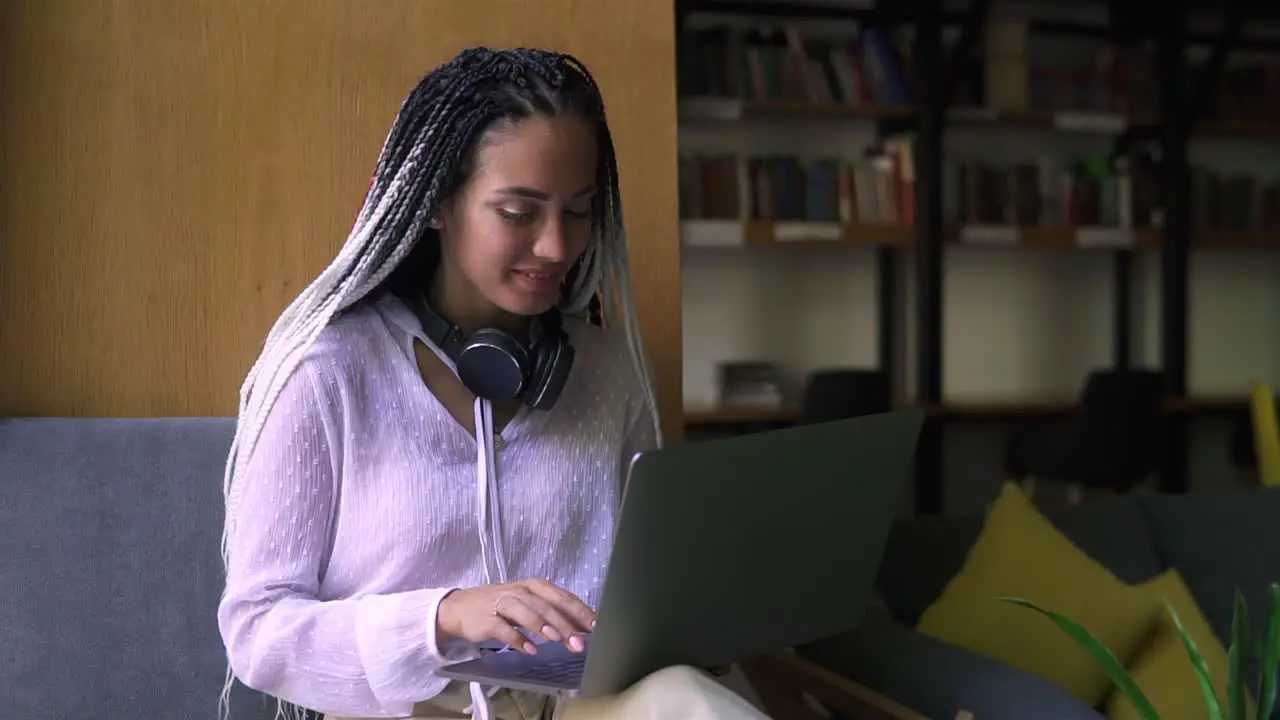 Stylish Dreadlocks Student Working On Laptop At Library Or Workplace 1