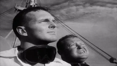 Archive Clip of Two Navy Personnel Observing Nuclear Bomb