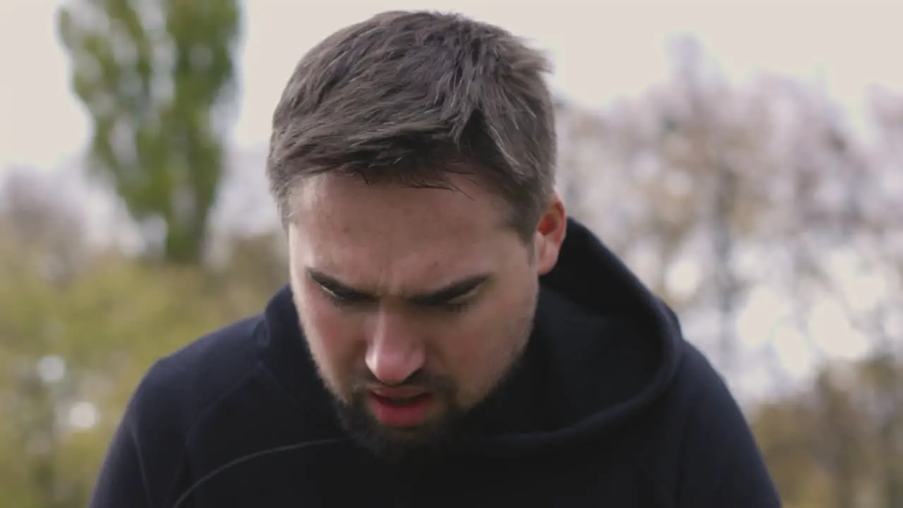 Tired Man Having Shortness Of Breath At Park In The Morning