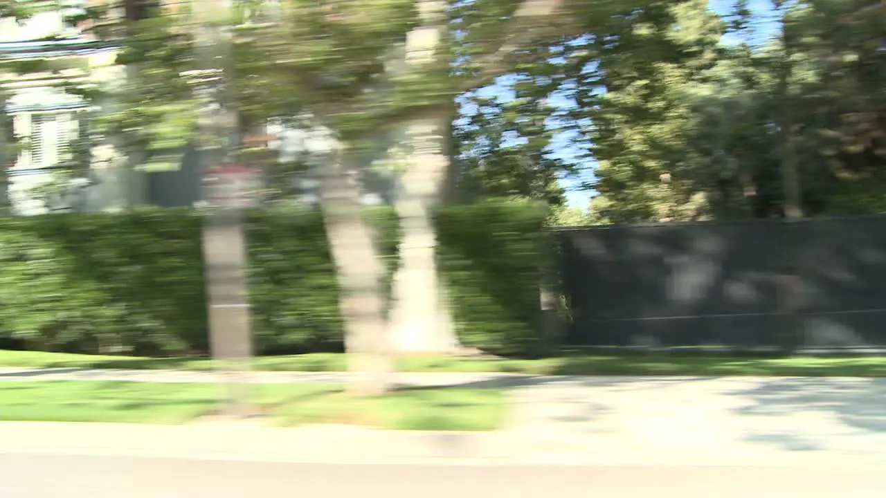 A Car Travels Along A Street In Century City Los Angeles As Seen Through The Side Window 3