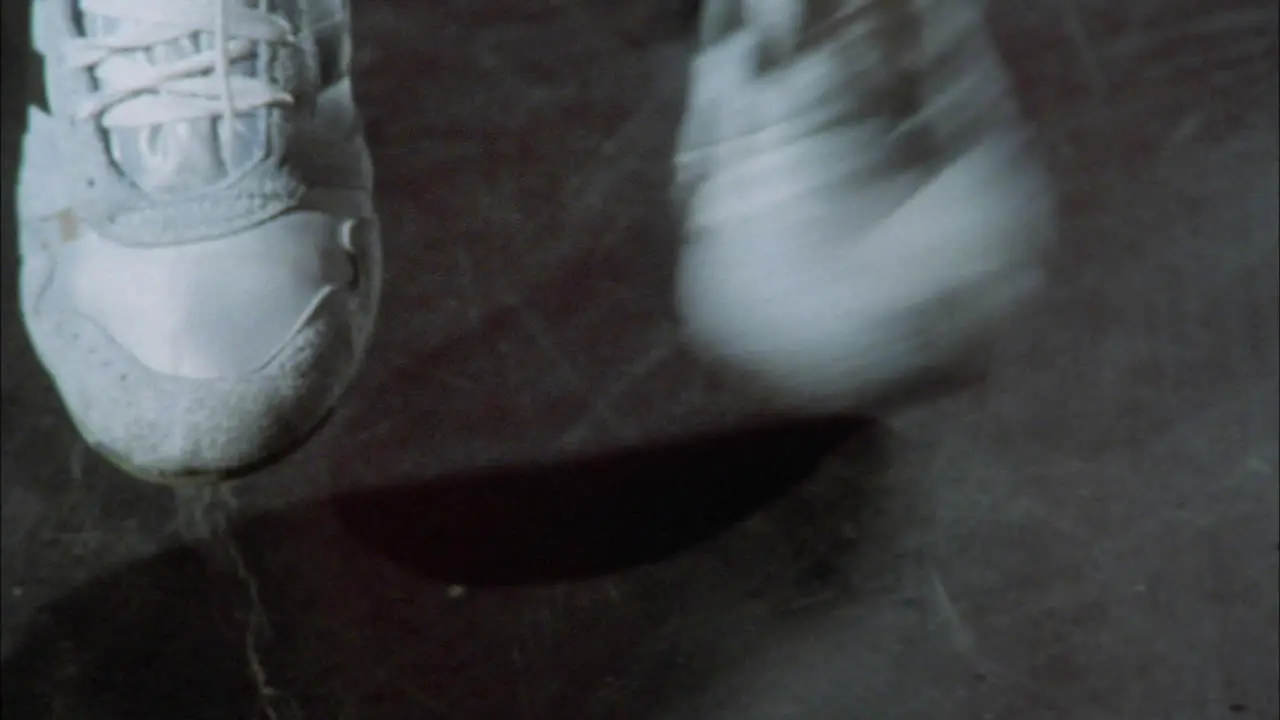 A boxer warms up by jumping rope