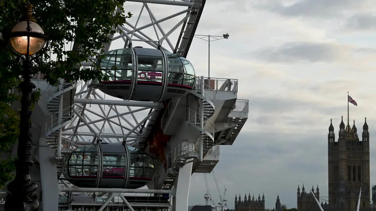 The London Eye in the evening and Palace of Westminster London United Kingdom