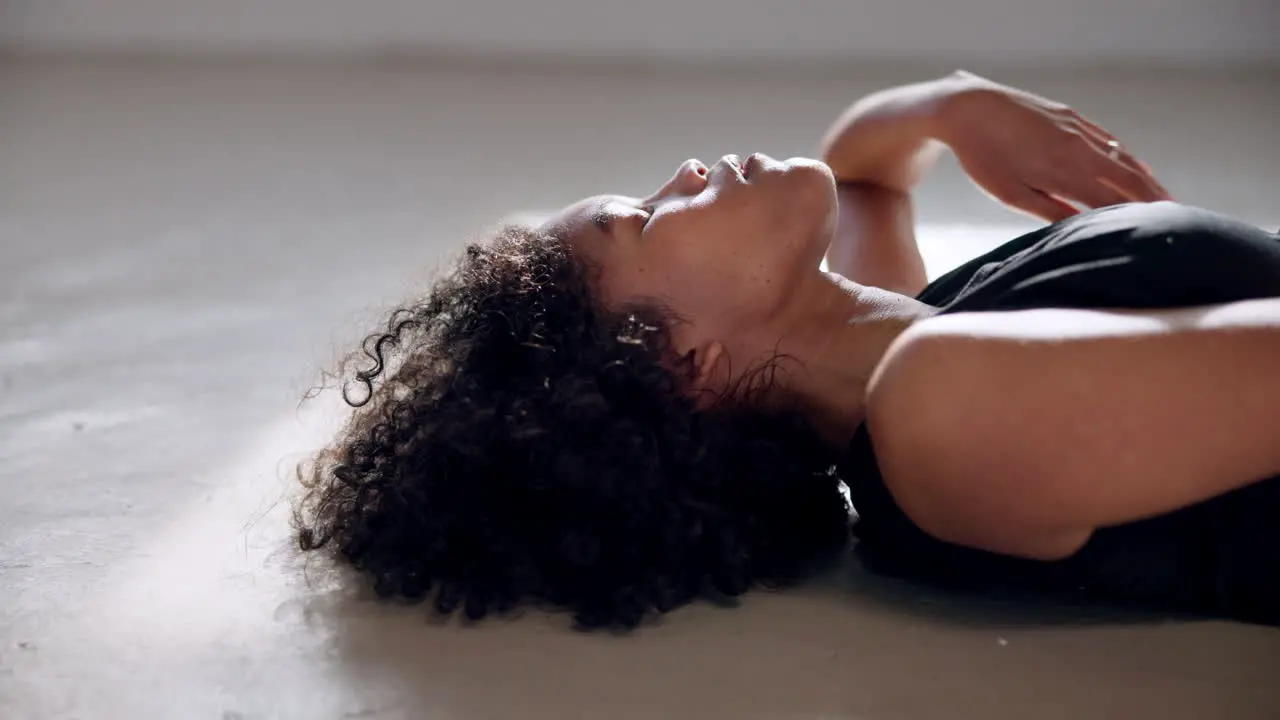 Dancing woman and lying on floor for performance