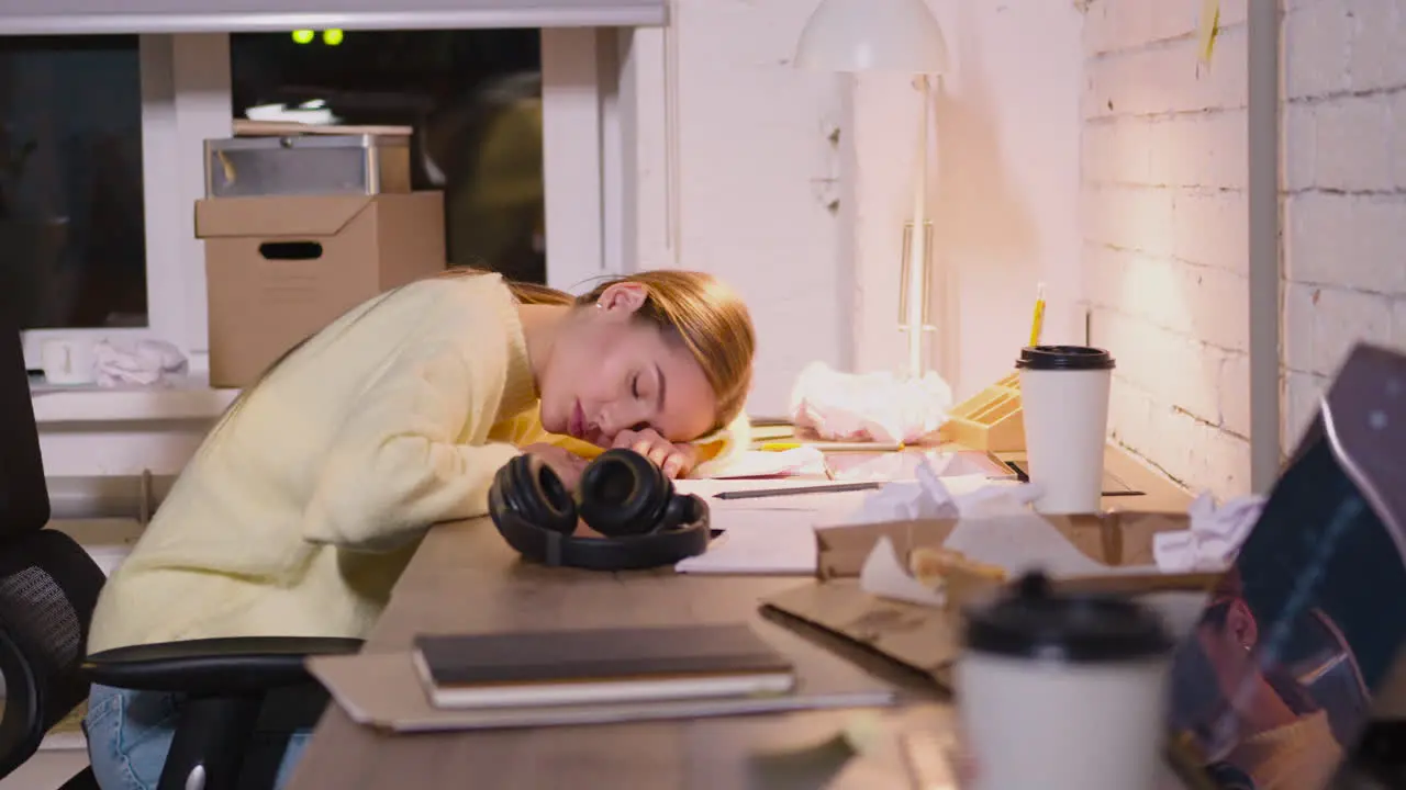 Tired Young Woman Taking Break To Rest And Having Nap At Workplace 1