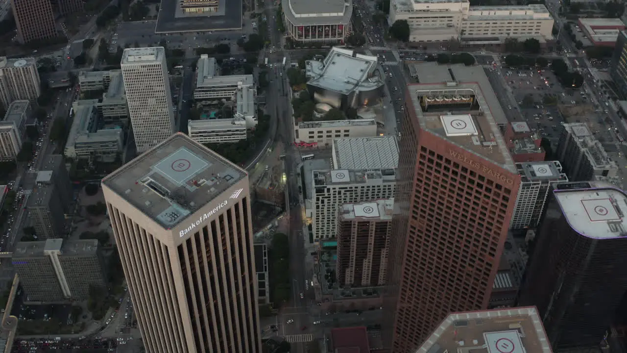 AERIAL Over Skyscrapers in Downtown Los Angeles California at Sunset