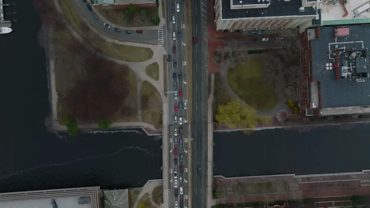 Birds eye shot of traffic in city Long queue of cars on multilane road and bridge over river Boston USA