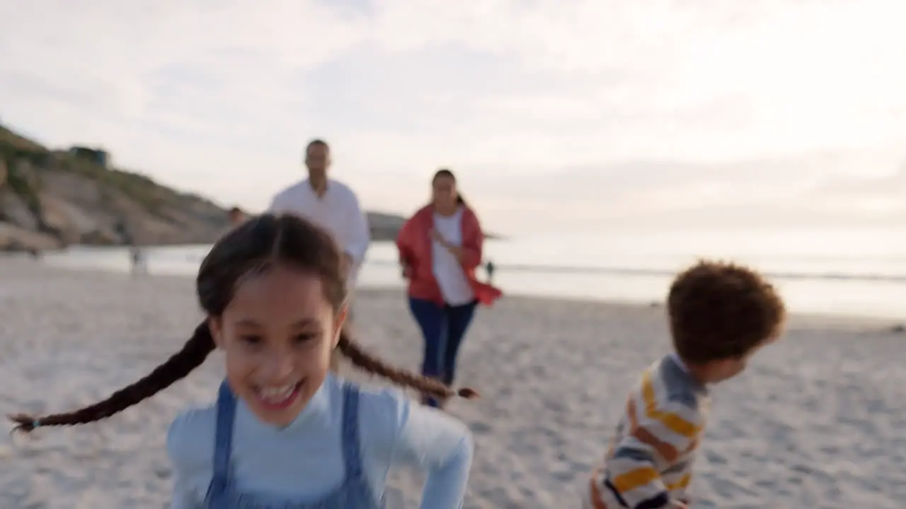 Family beach and running with parents