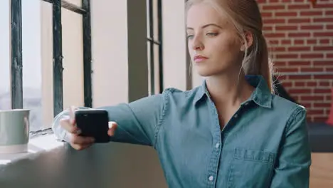 Business woman phone and thinking by window