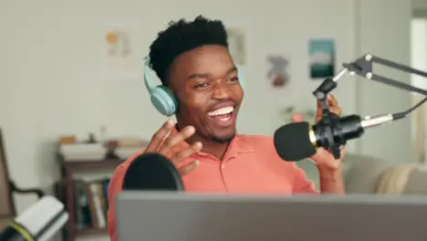 African radio presenter talking with a microphone