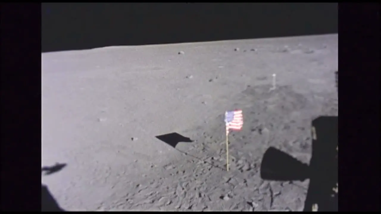 Surface of the moon + American flag