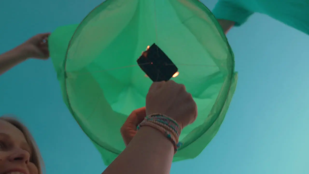 Woman firing sky lantern