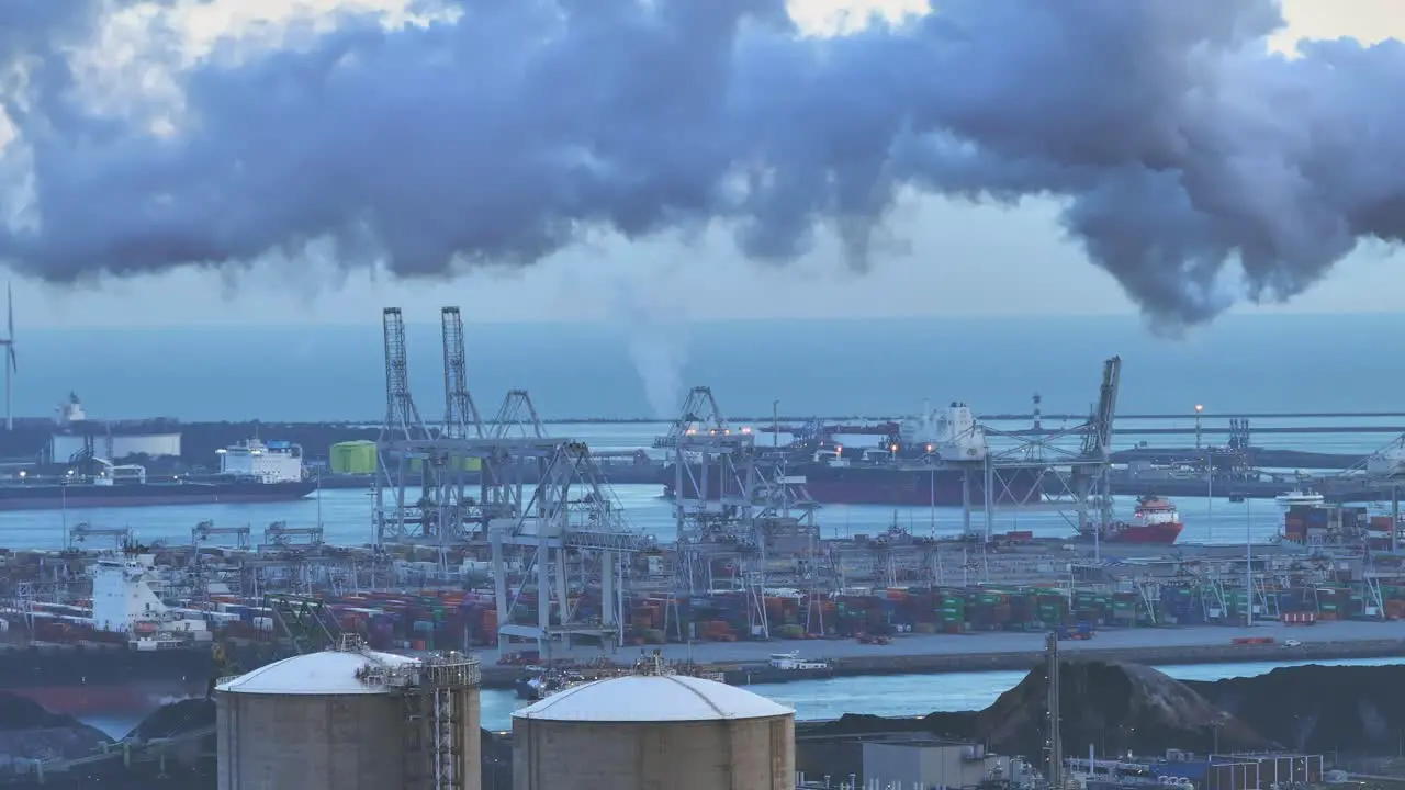 Industrial storage containers and view of Onyx power plant Rotterdam