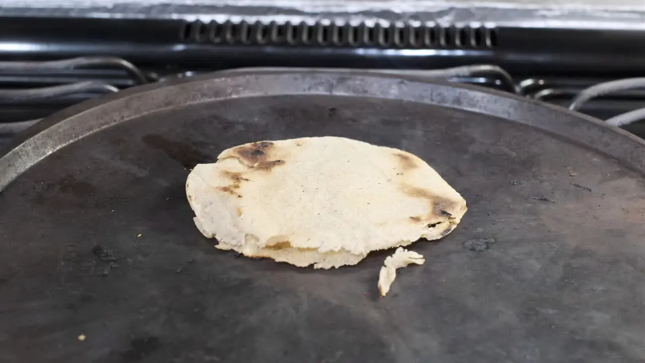 A timelapse of a Mexican tortilla being heated until it burns black 4K