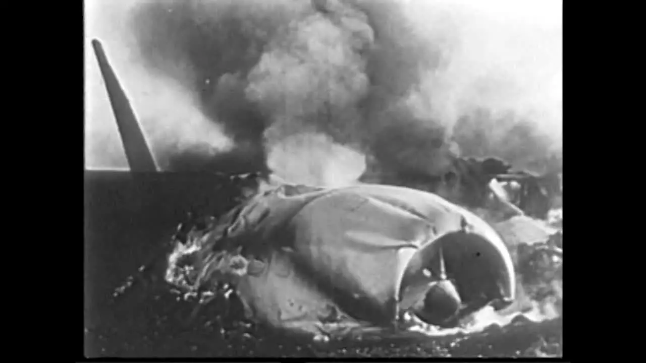 Archive Clip of Grounded Plane Debris Burning After First Soviet High Altitude Nuclear Test 01 