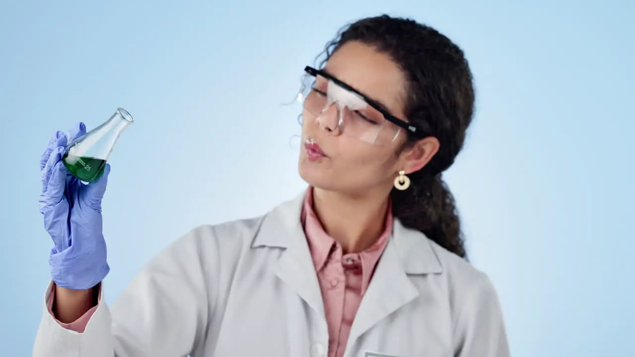 Women scientist and glass beaker for chemical