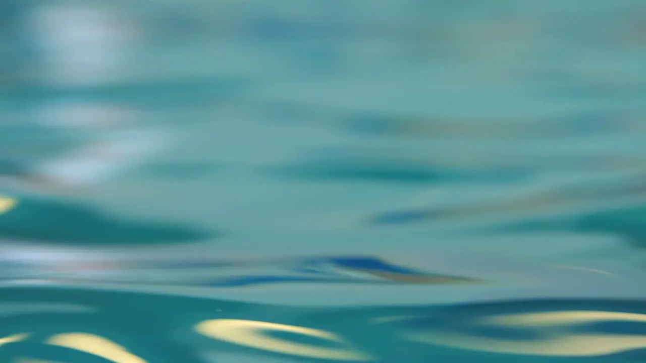 Water background Closeup of smooth water surface Shiny water surface