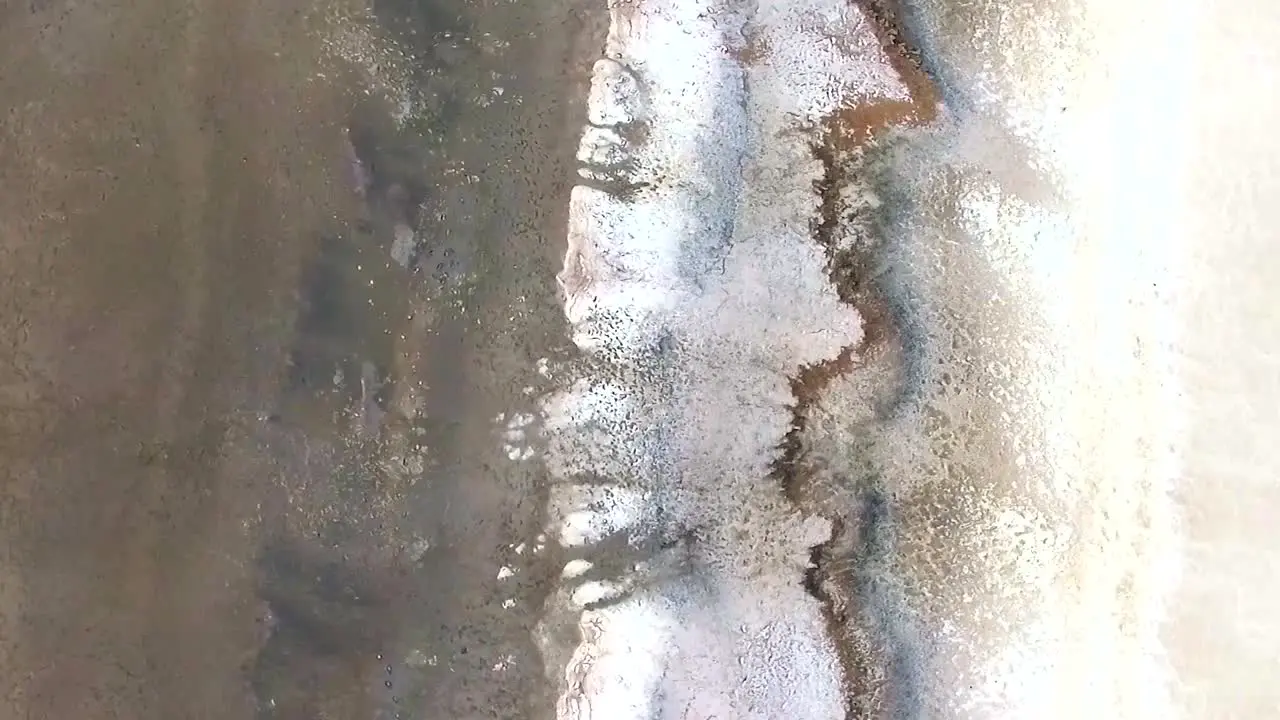 Top drone shot of a salt lake shot with a drone