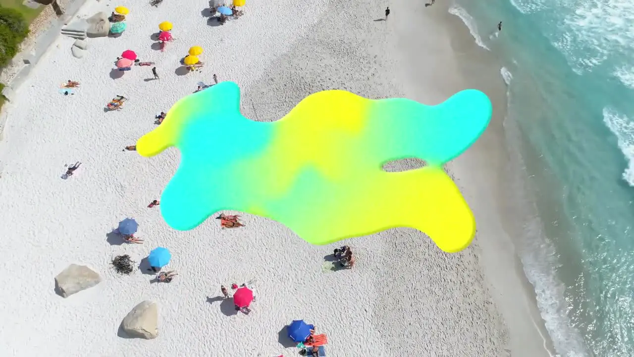 Digital composition of gradient abstract shape with copy space against aerial view of the beach