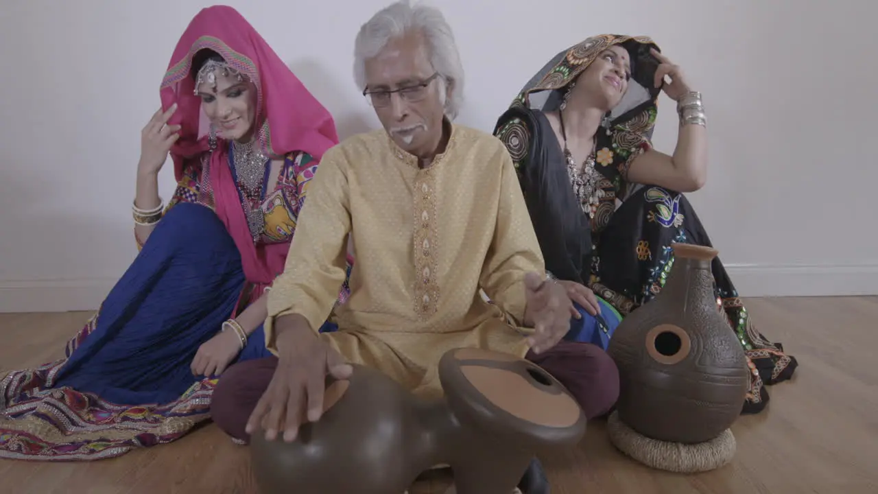 Indian Percussion Musician with Dancers 10