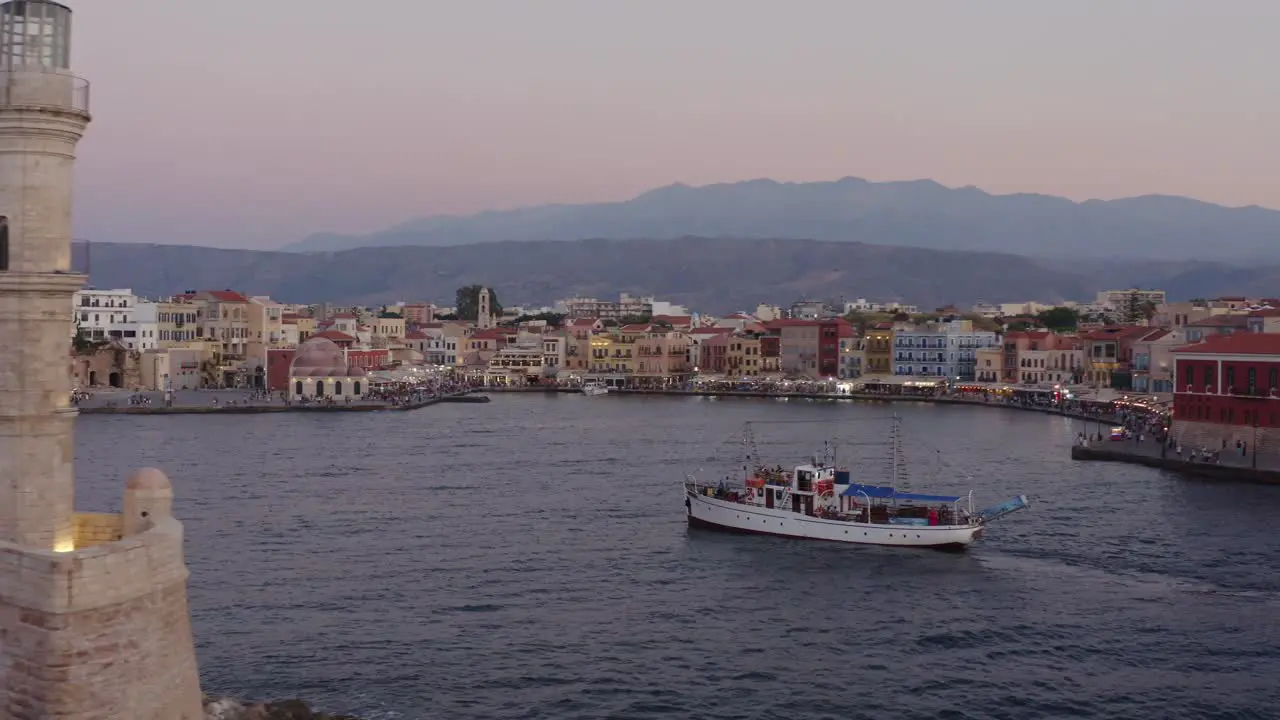 Aerial Lighthouse of Chania Greece with large boat